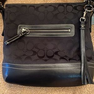 Coach cross body with convertible strap. Black fabric with leather accents.